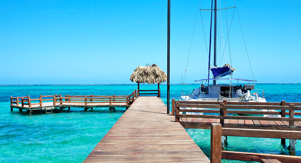 Belize Pier with Sailboat