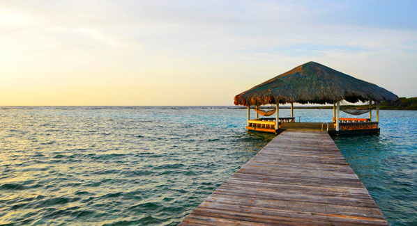 Honduras Roatan Barefoot Cay Pier Palapa